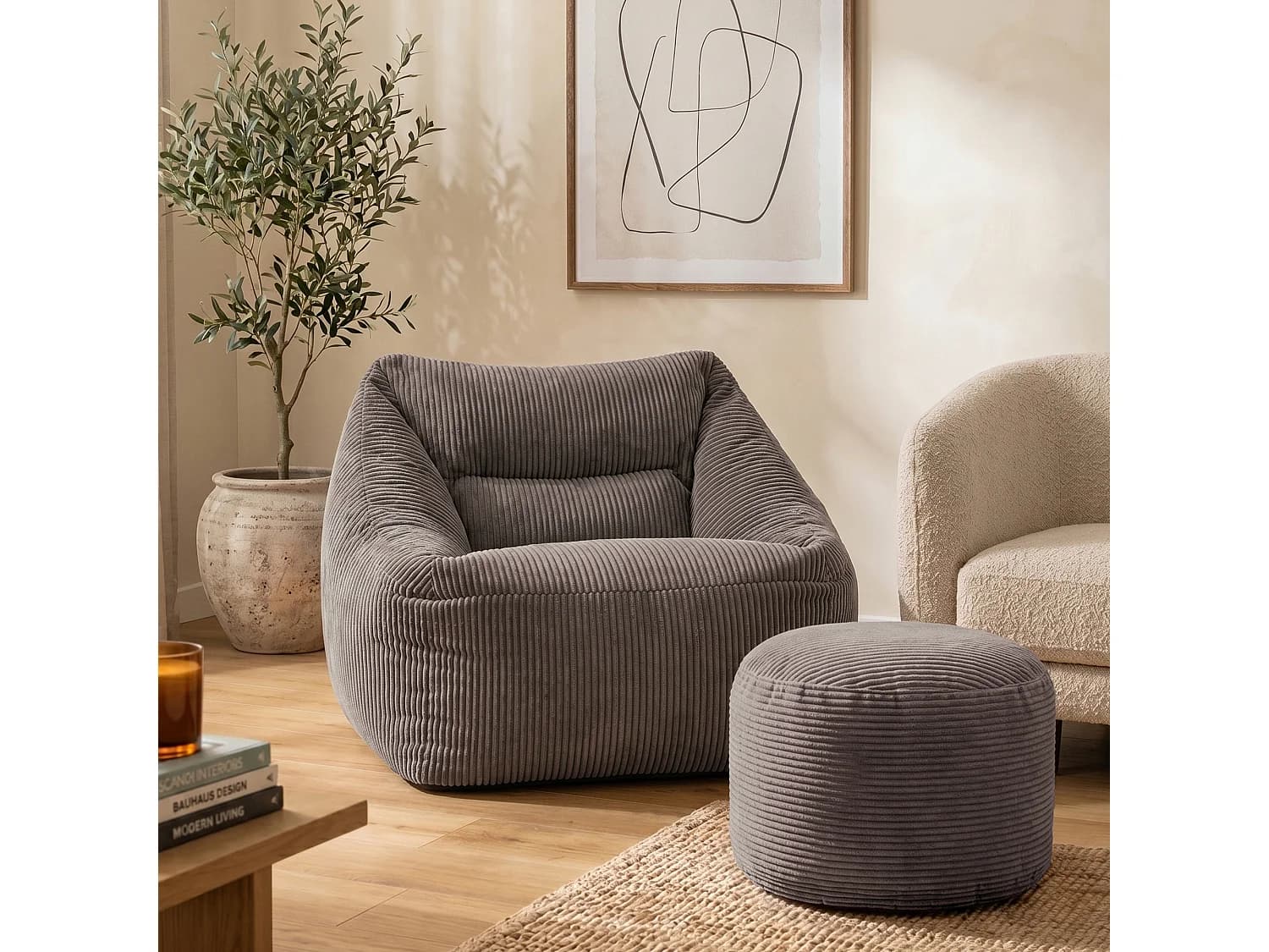Pouf fauteuil avec repose-pied rond velours côtelé gris anthracite, salon ou chambre - NATALIA