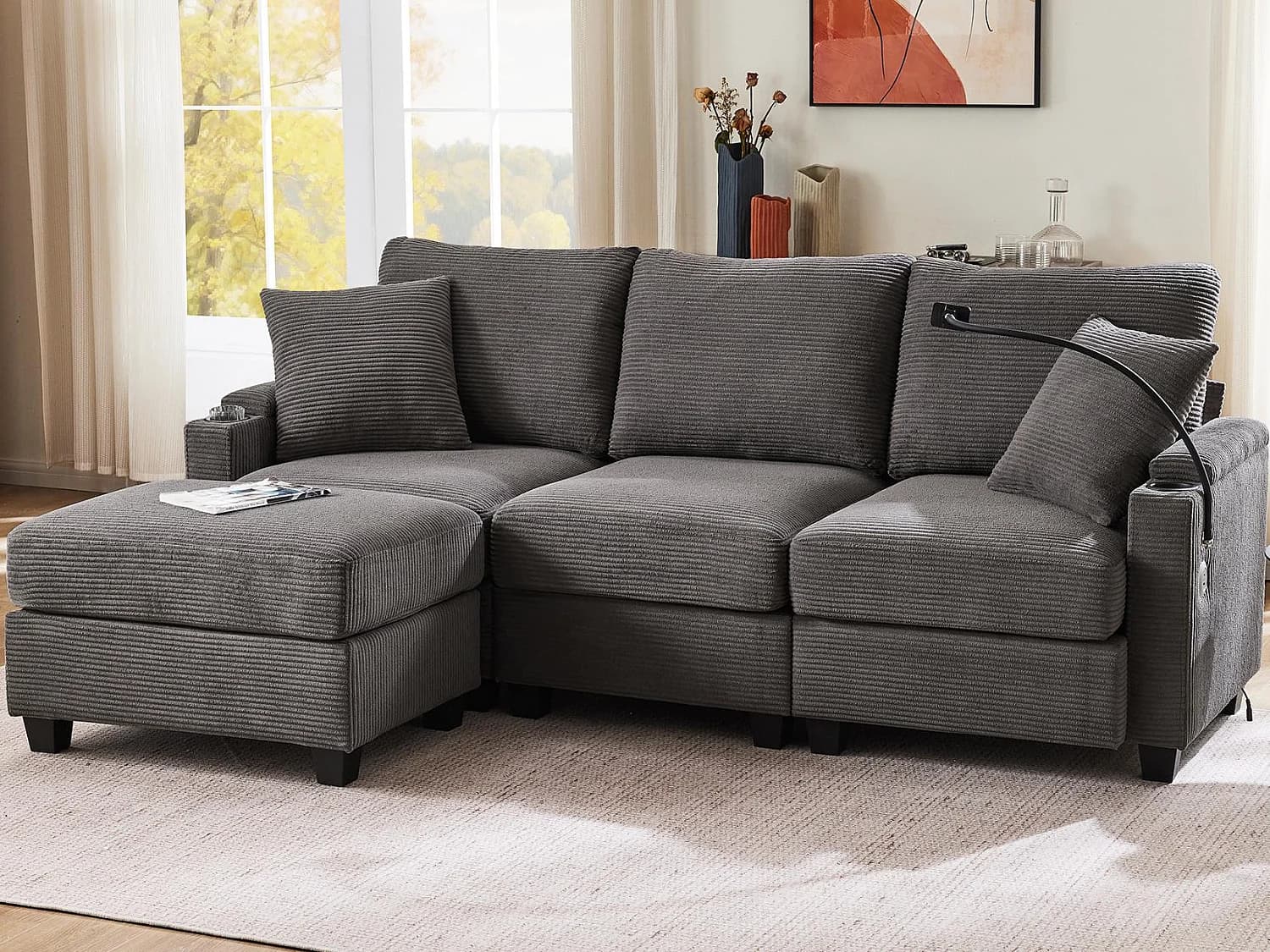 Canapé d'angle en L - 3 places - Avec repose-pieds + porte-gobelet - Chargeur USB - 2 coussins - Gris foncé