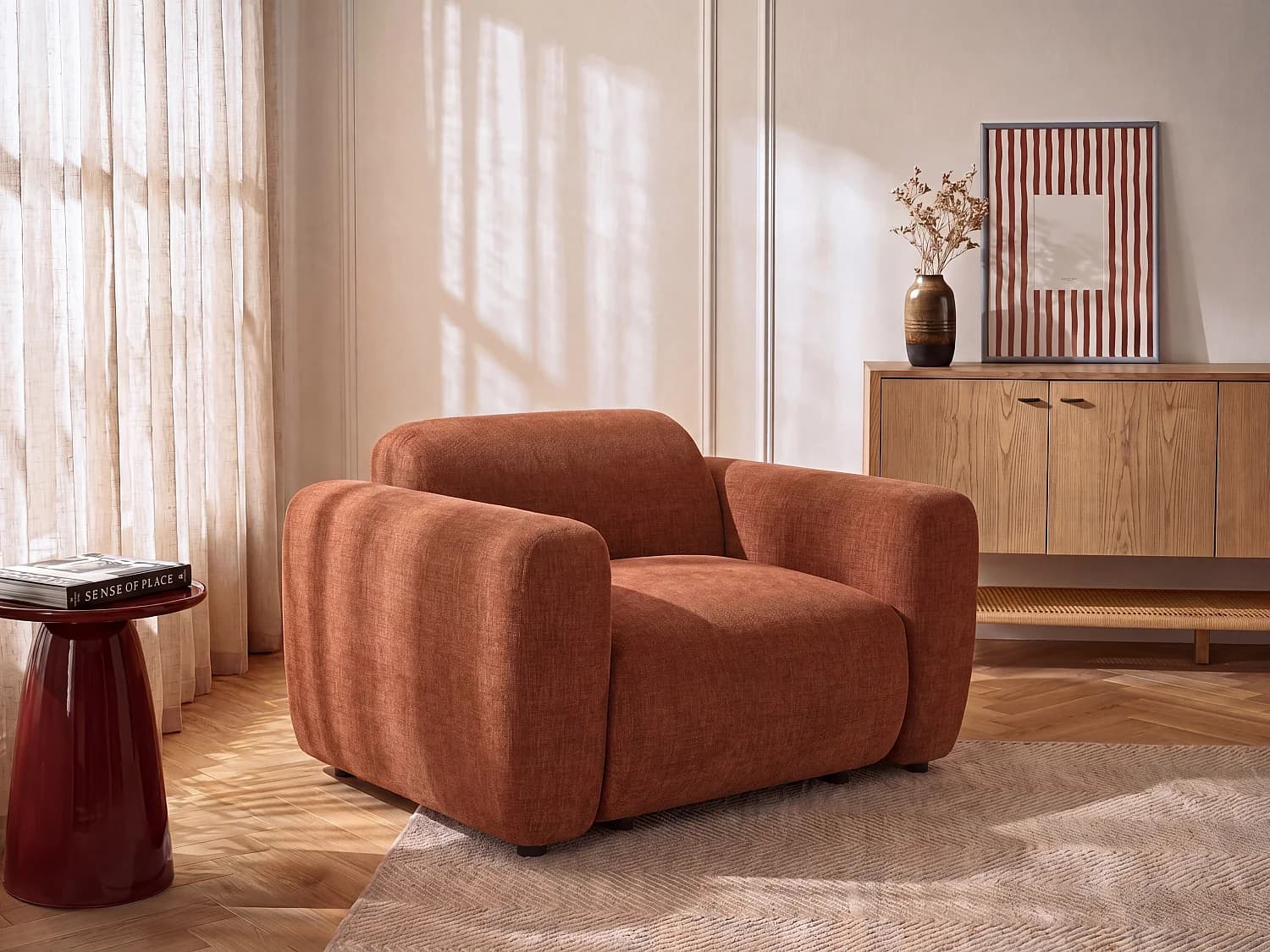 Fauteuil en tissu terracotta POGNI de Maison Céphy