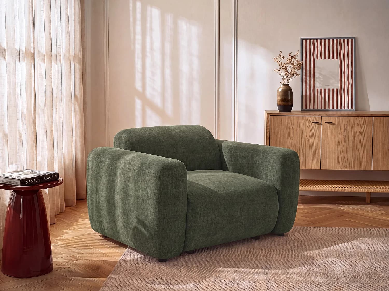 Fauteuil en tissu vert POGNI de Maison Céphy