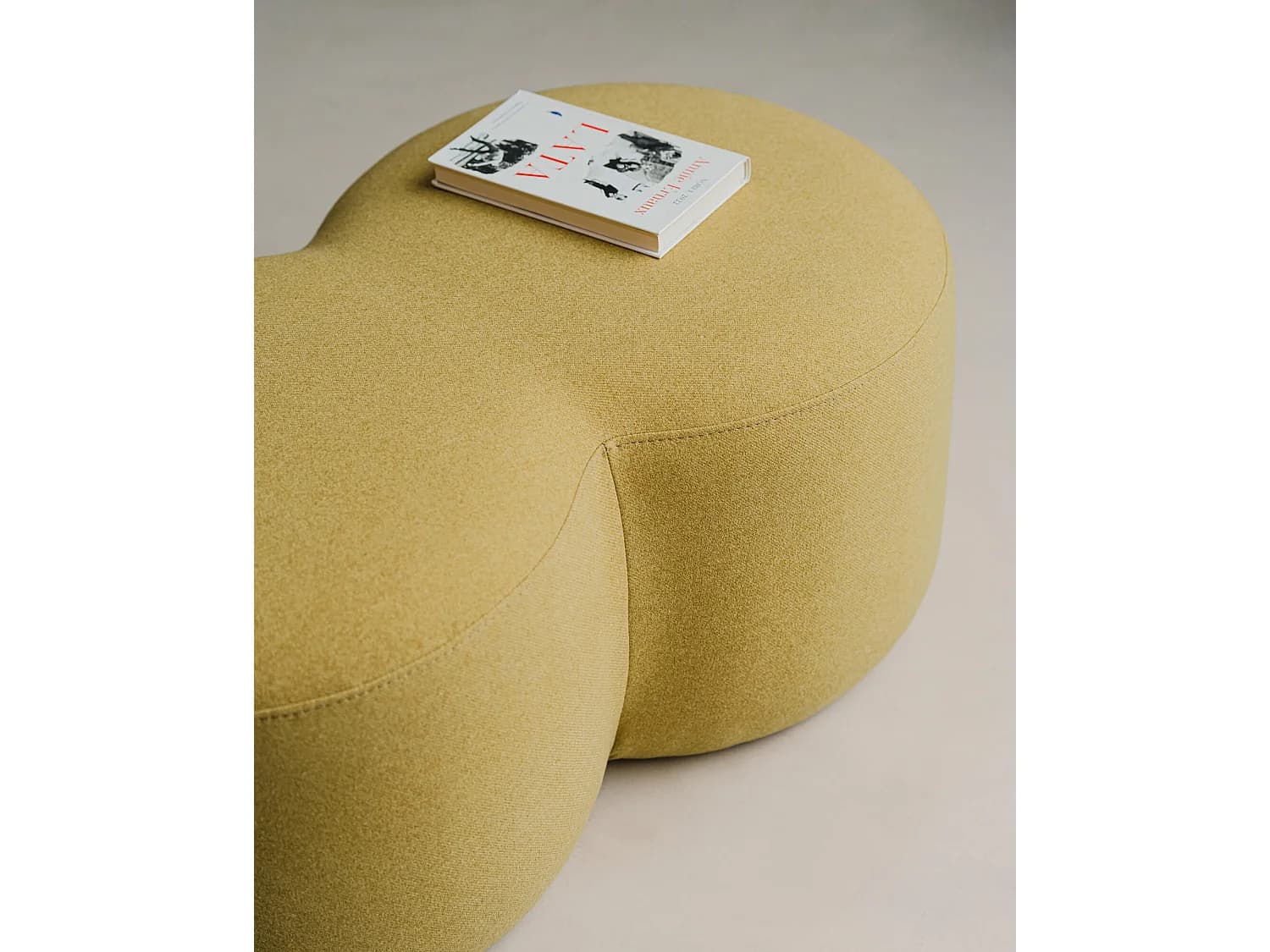 Pouf Umbo - pouf rond en polyester 100% moderne et polyvalent