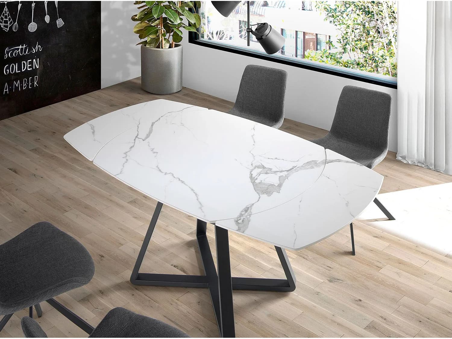 Table à manger à rallonge baril ovale marbre porcelaine et acier noir 1096 ANGEL CERDA